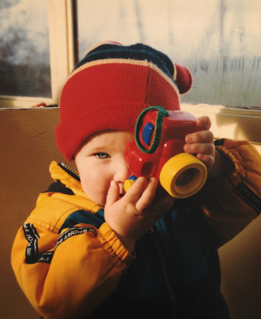 Dan as a child with his first camera — where the passion started